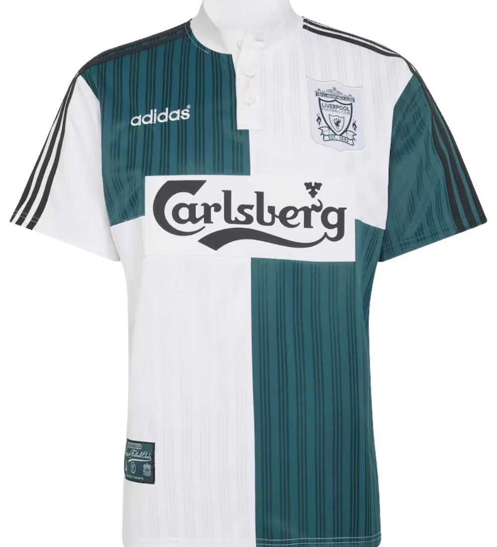 Crafted for comfort and nostalgia, the Liverpool 1995 Away Jersey Green & White features a classic fit with breathable fabric, making it ideal for both casual wear and matchday style. The striking color combination sets it apart from traditional kits, giving it a standout vintage appeal. Whether you're honoring club legends or expanding your retro collection, this shirt delivers authenticity and style.